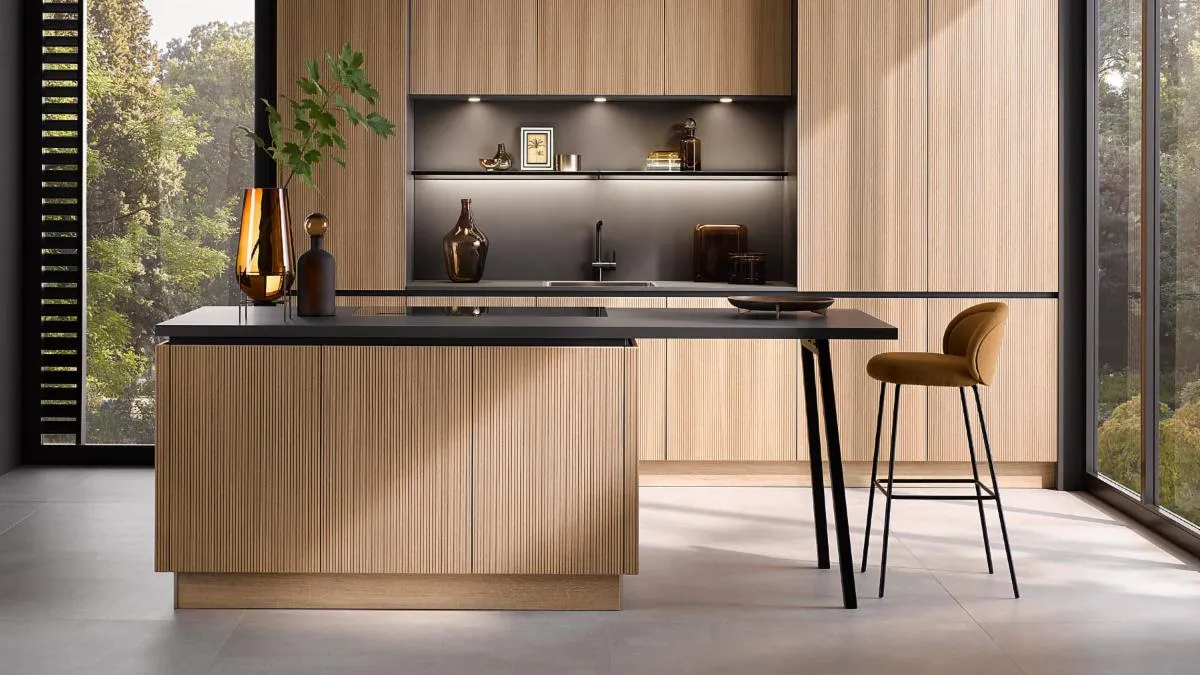 A kitchen with wooden cabinets.