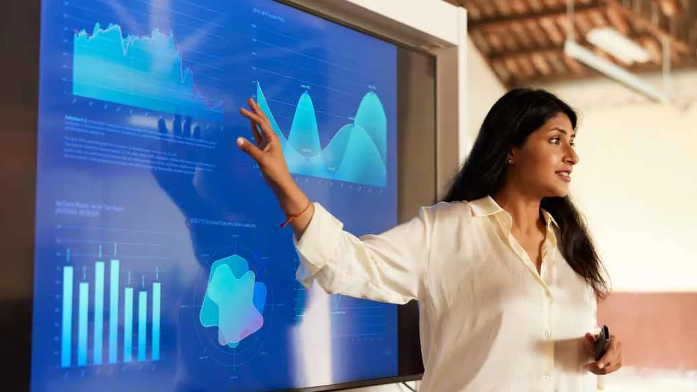 A businessperson sharing charts in a presentation speech.