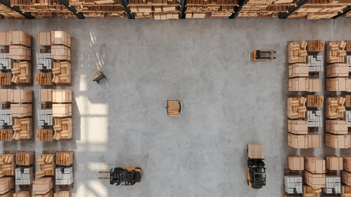 High Angle View Of Warehouse With Forklift, Pallet, AGV And Cardboard Boxes