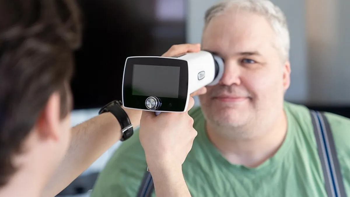 A patient being examined for retinal problems related to diabetes