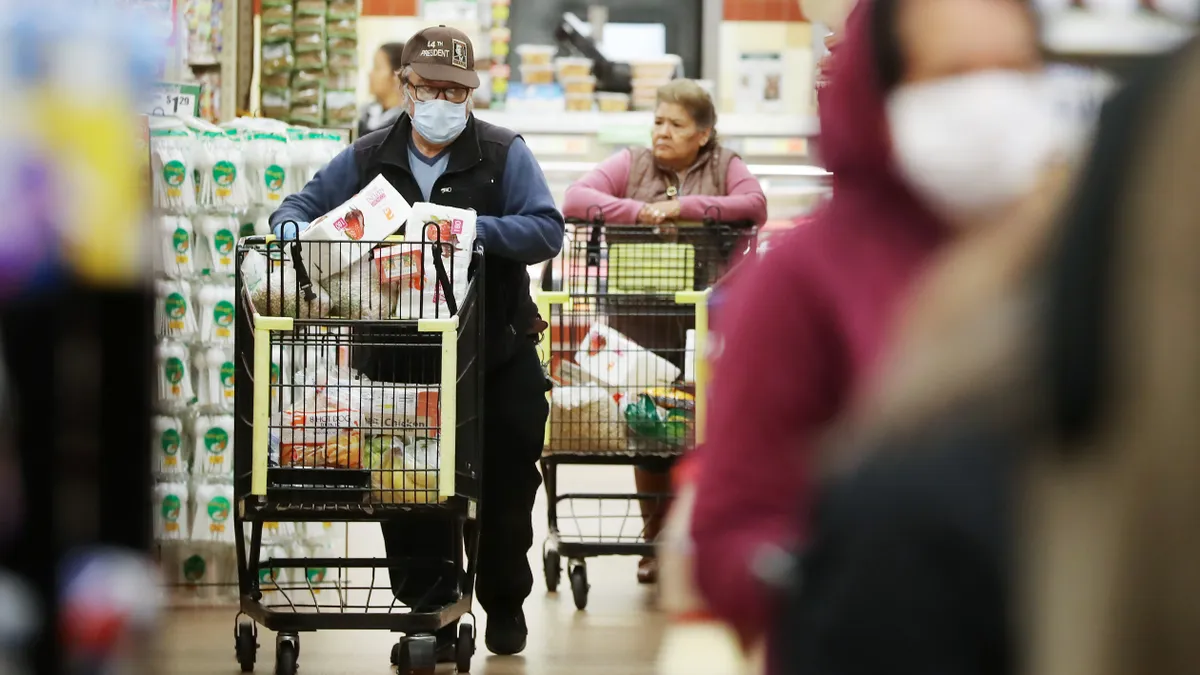 People grocery shopping