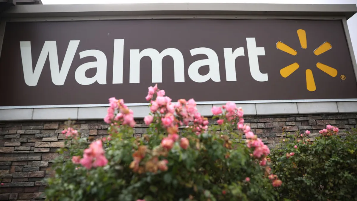 A sign is posted in front of a Walmart store on November 16, 2021 in American Canyon, California.