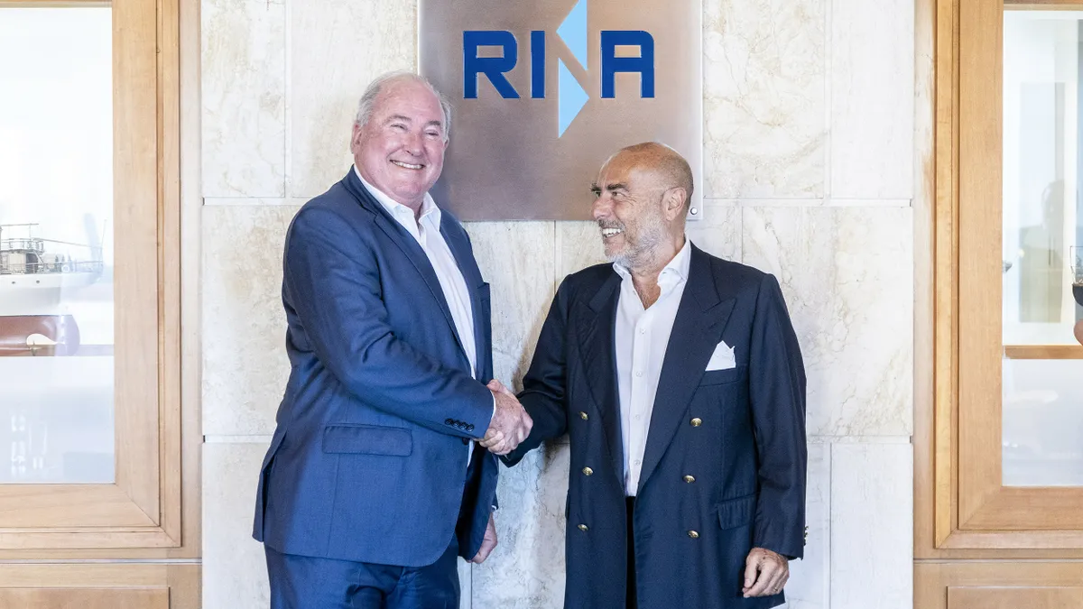 Ugo Salerno, chairman and CEO of RINA (right) shakes hands with Daniel Dietzler, founder of Patrick Engineering (left)