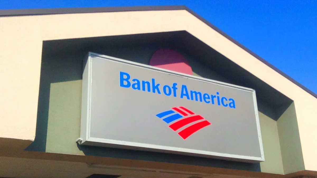 The facade of a Bank of America branch facility.