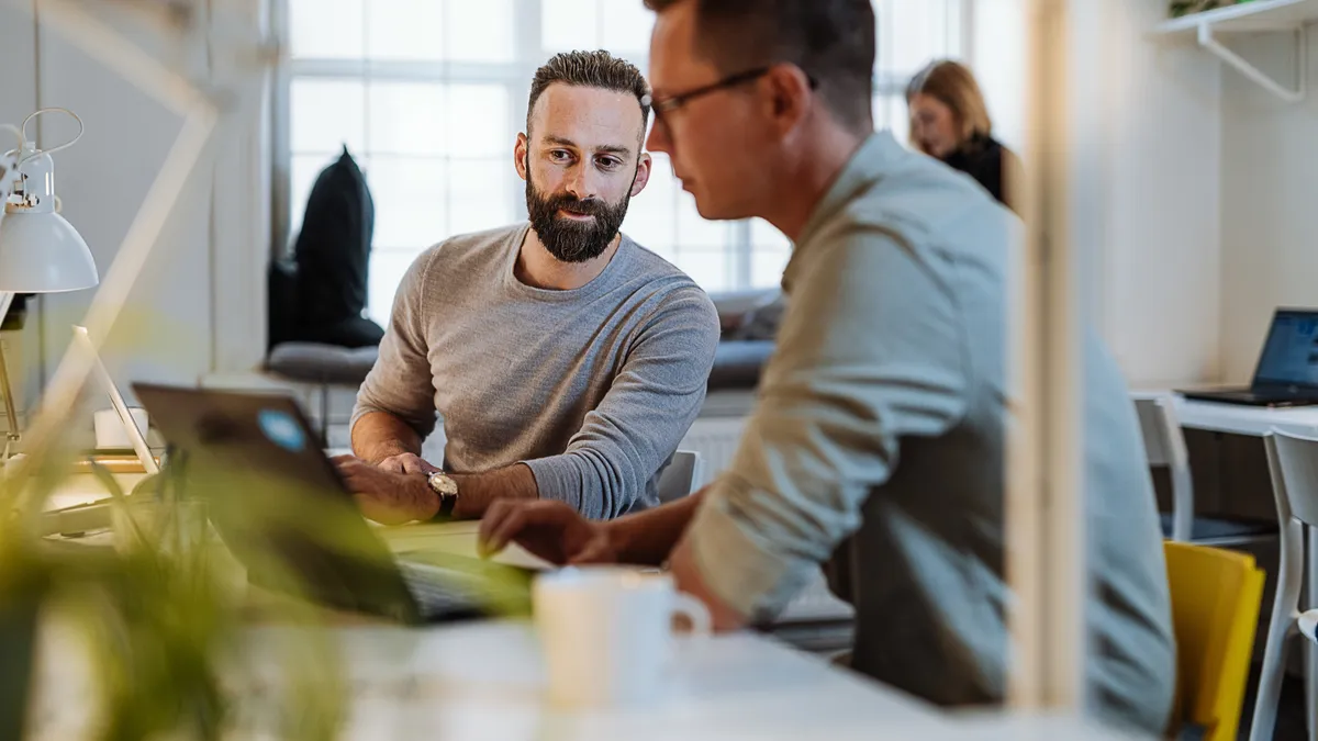 Diverse entrepreneurs and small business owners working in coworking space.Programmers and software engineers working in office.