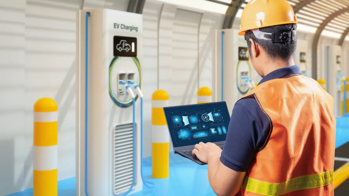 Technician with EV charging stations