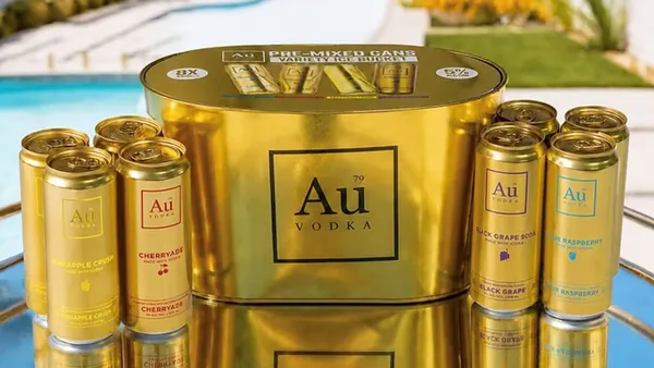 A variety pack of Au Vodka sits poolside.