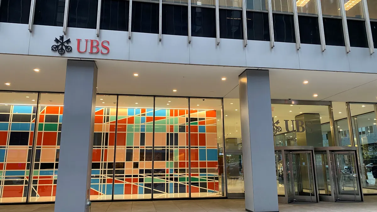 A UBS location in New York City is shown, with the letters "UBS" on the building front.