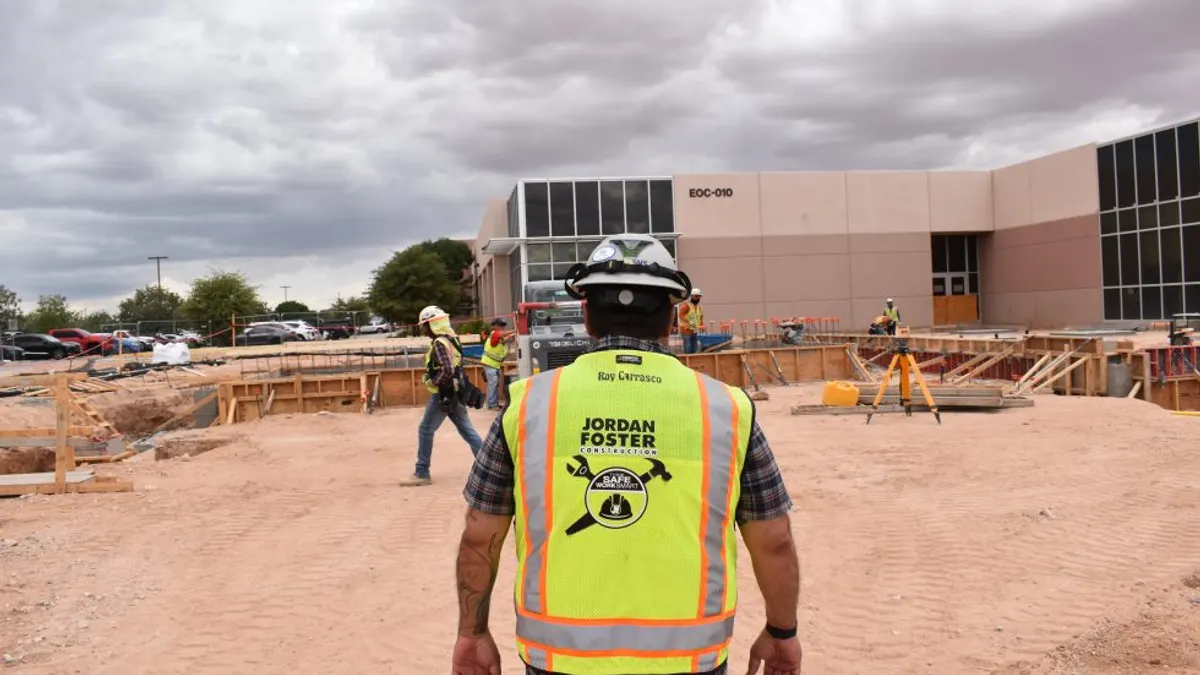 Jordan Foster Construction worker walks the Eastside Operations Center facility site