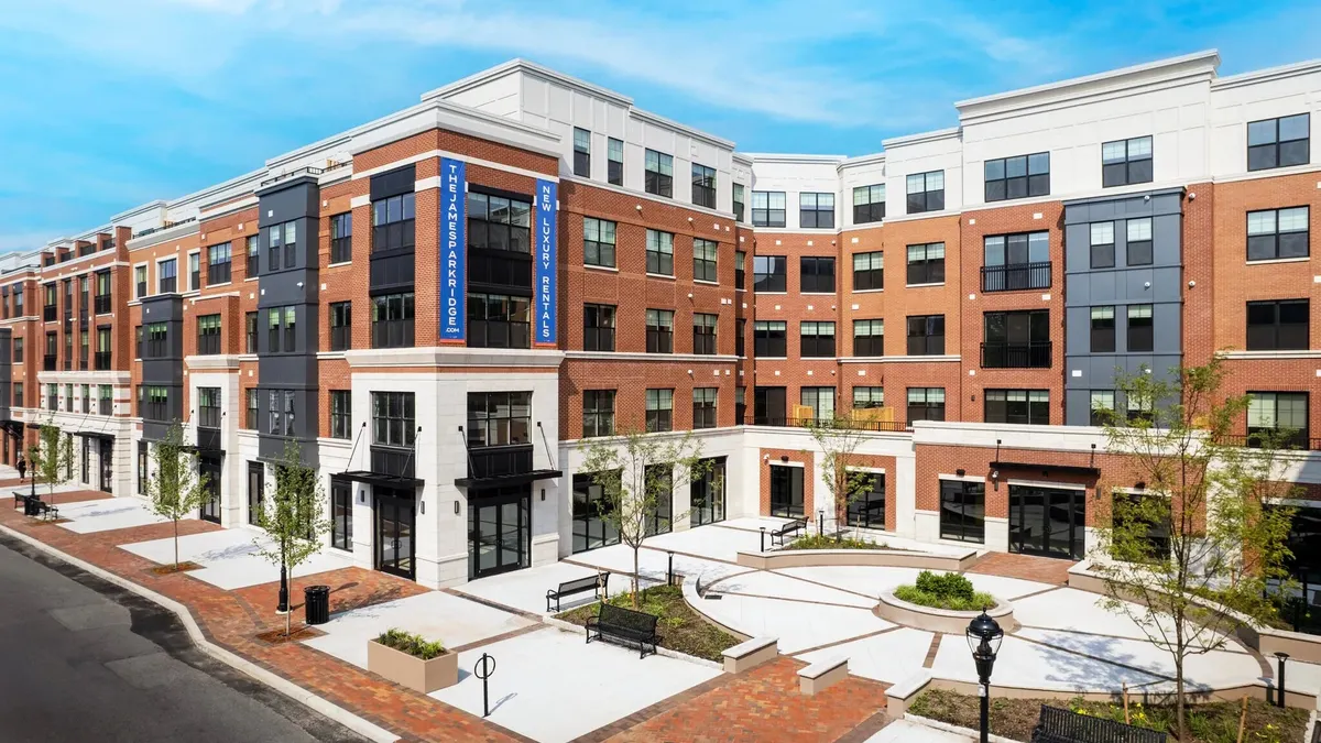 New mid-rise brick apartment building