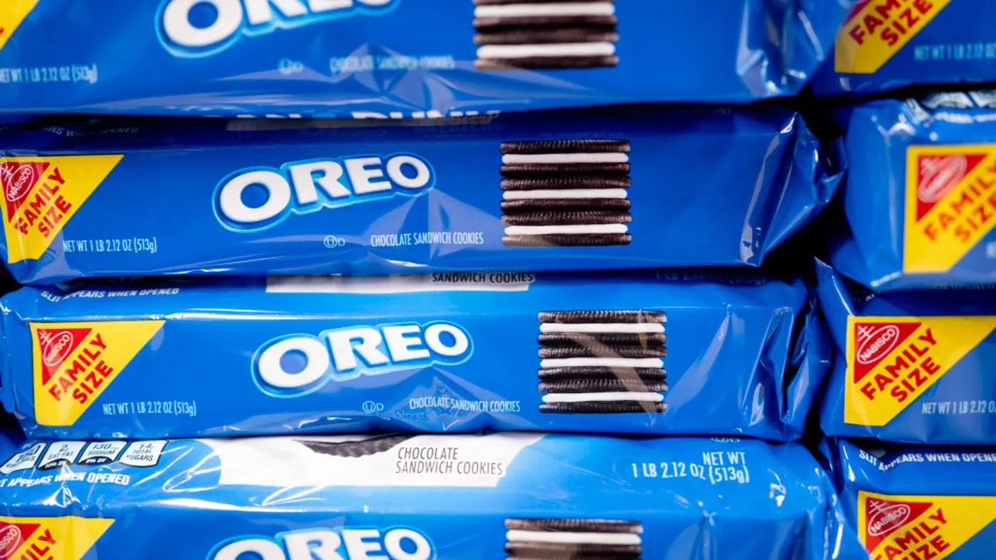 Packages of Oreo Cookies on a grocery store shelf.