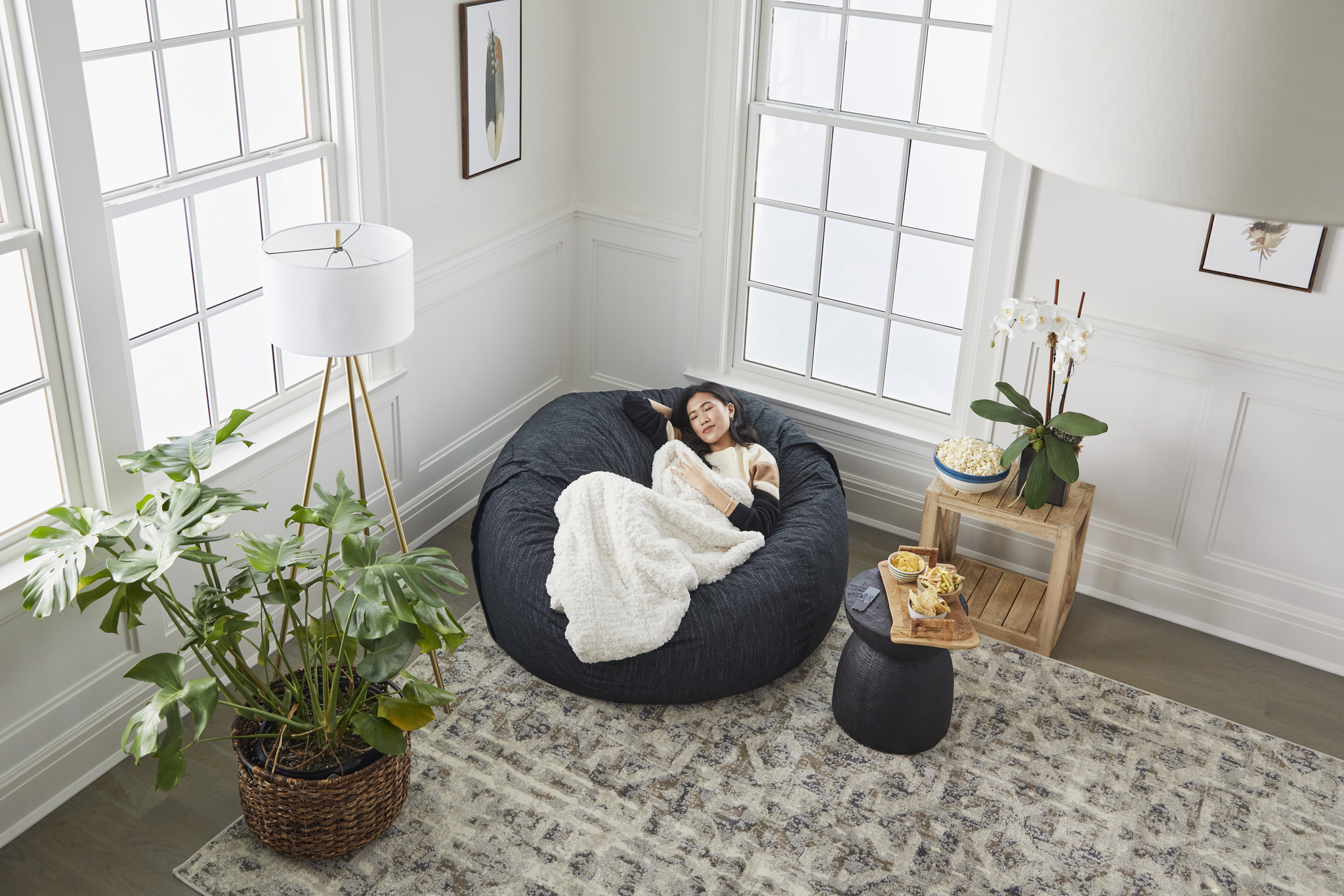 Woman sitting on bean bag