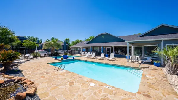 Pool and apartment community clubhouse