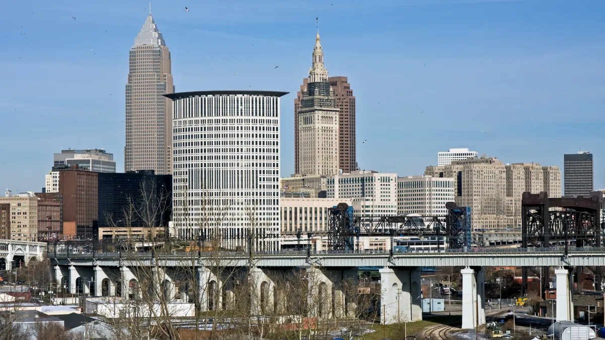 A landscape perspective shows Cleveland's skyline.