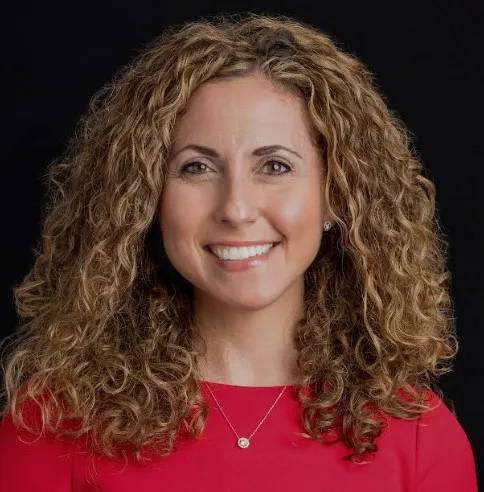 Woman in red shirt.