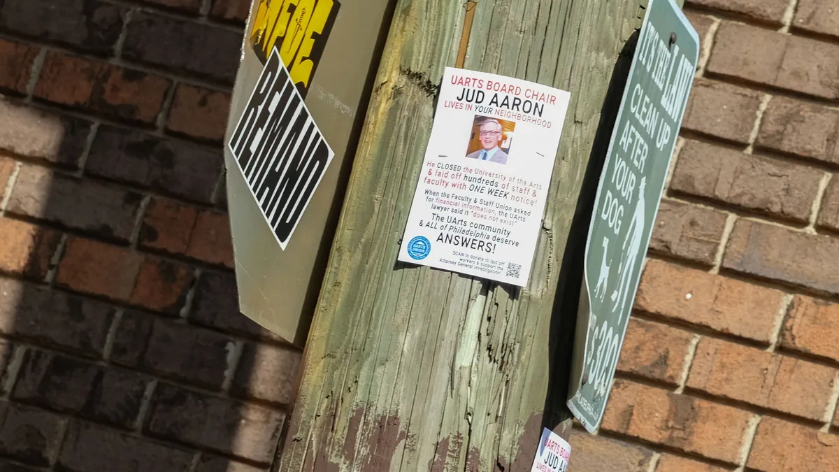 A flyer showing a headshot of a person in suit and tie and red and white text saying “He closed the University of the Arts and laid off hundreds of staff and faculty with one week notice!”