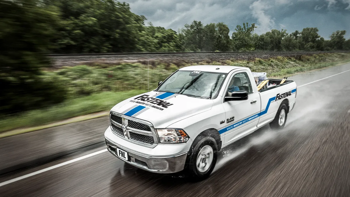 A Fastenal truck in the rain.