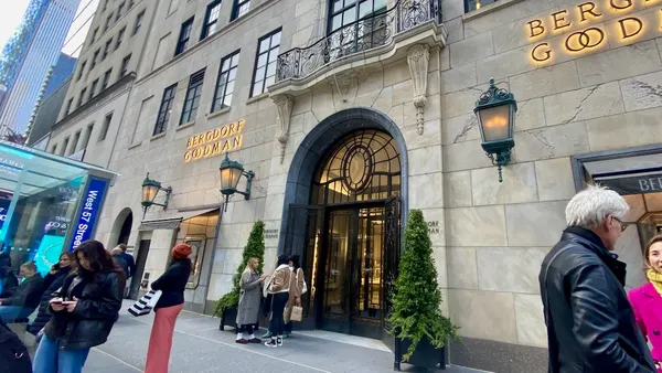 People in the city gathered around a department store entrance.