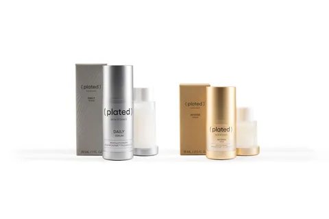 A variety of gold- and silver-colored bottles and outer packaging from Rion Aesthetics.