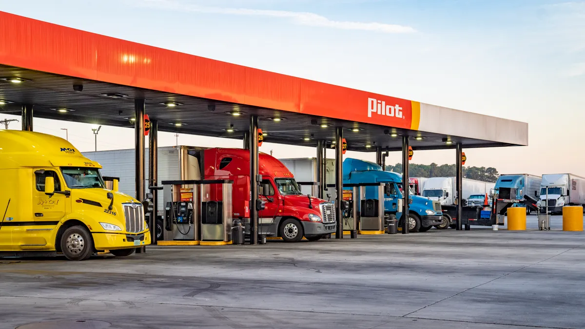 A photo of trucks parked at a Pilot Co. location.