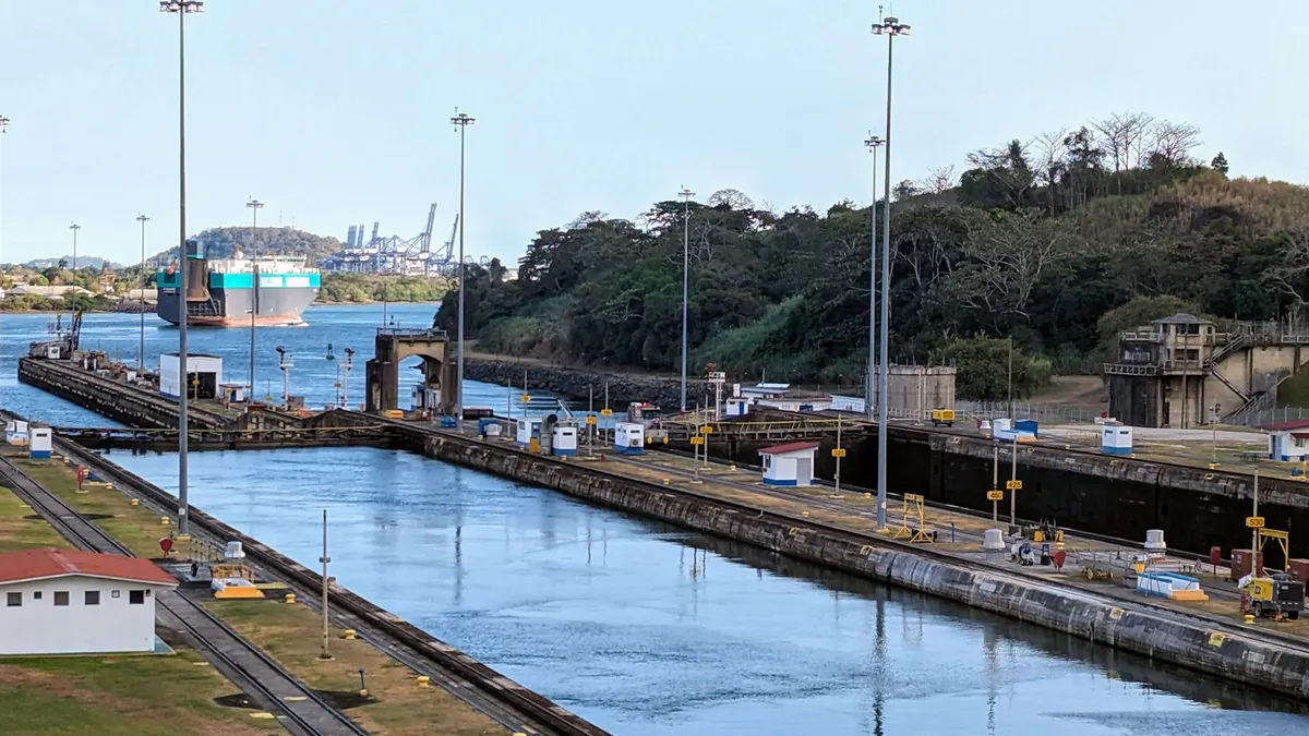 Ocean shipping vessel heads toward the Pacific Ocean after passing through the Panama Canal's Miraflores Locks