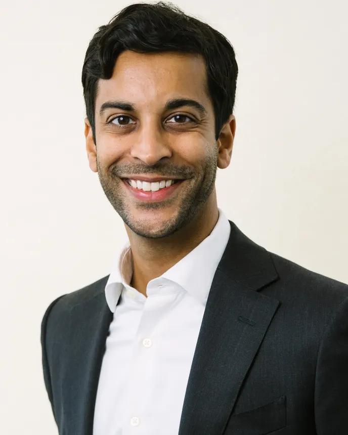 A headshot of Manav Kumar