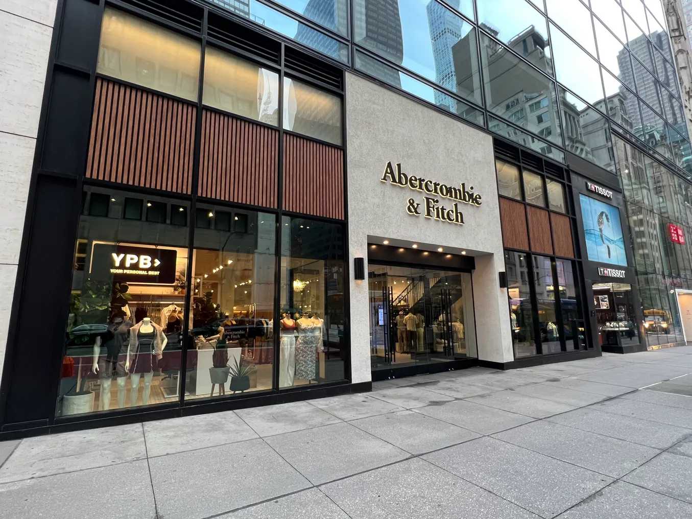 A closing store on a city block.