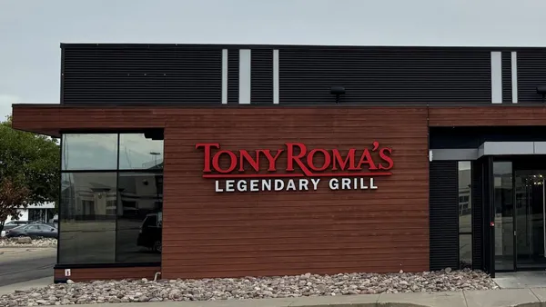 An image of a brown building with red logo that says Tony Roma's