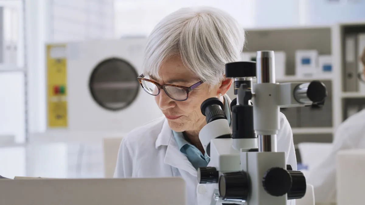Research scientist testing and experiment with microbiology in a laboratory.