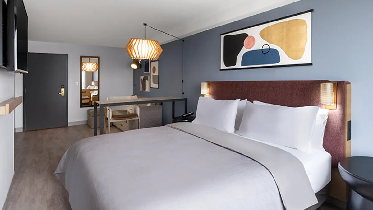 The inside of an Atwell Suites hotel room by IHG Hotels & Resorts