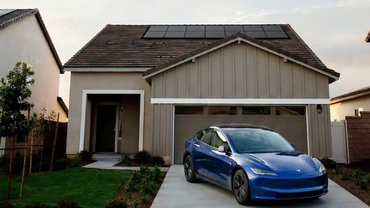 A modern blue electric car parked in front of a suburban house with solar panels on the roof, conveying a clean energy and eco-friendly lifestyle.