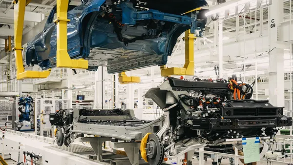 A R1T electric pickup on the assembly line of the Rivian factory in Normal, Illinois.