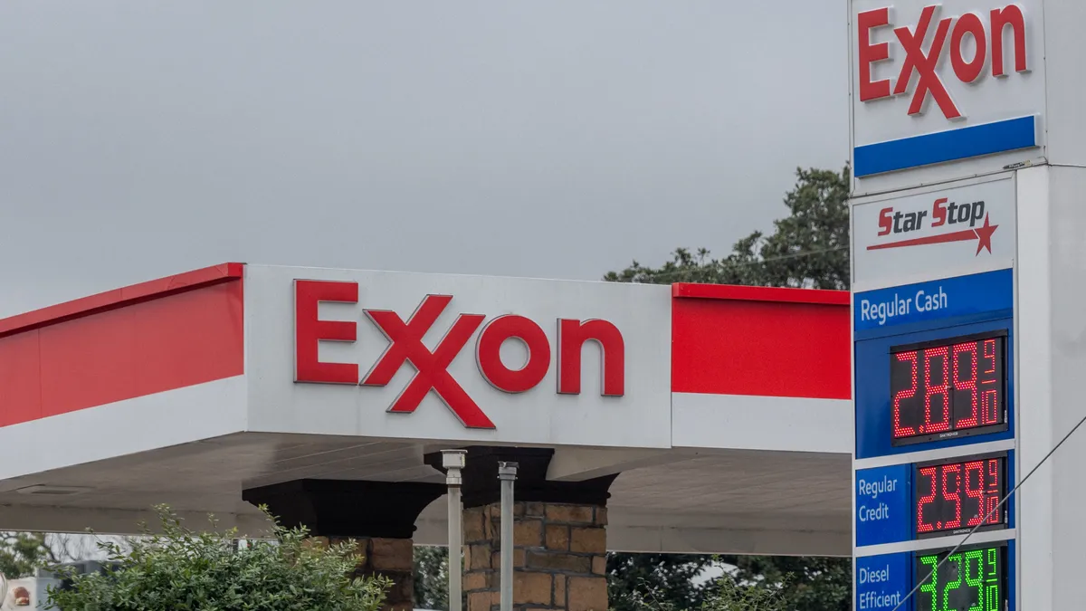 Prices are displayed at an ExxonMobil gas station