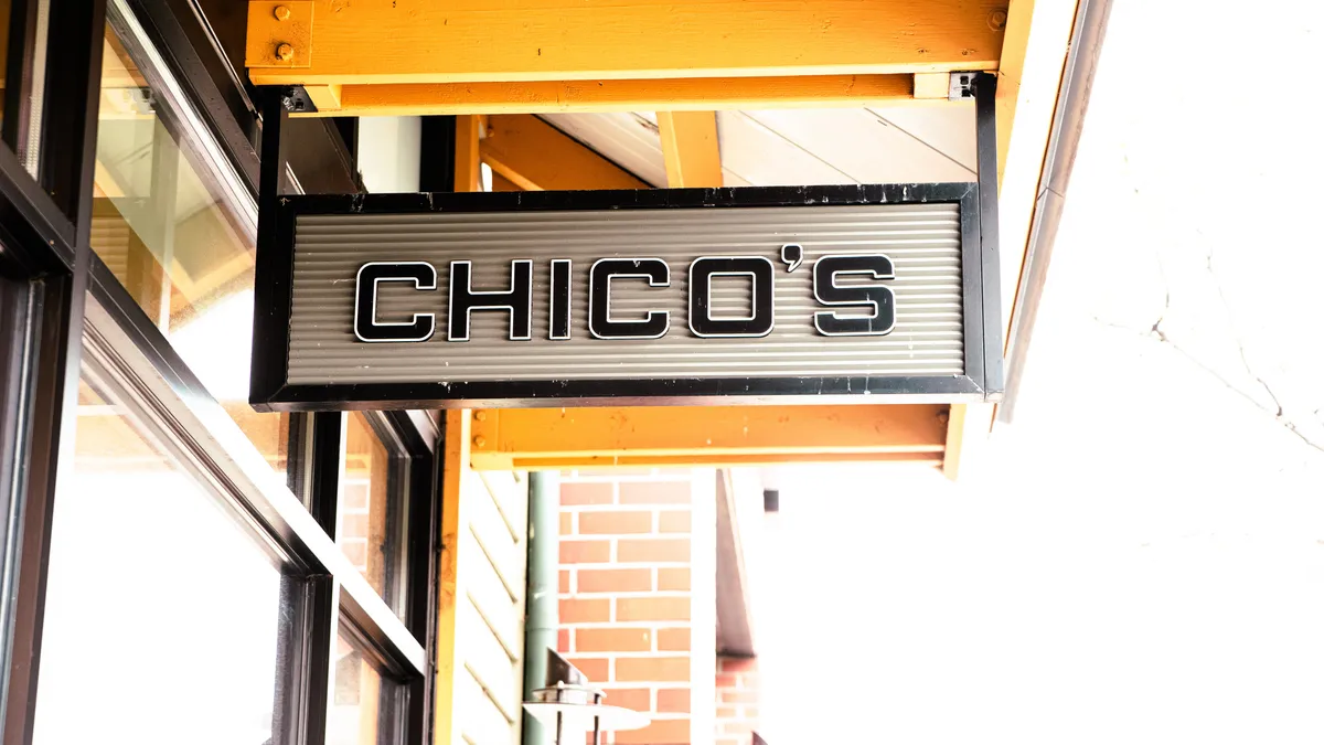 A small hanging store sign reads "Chico's."