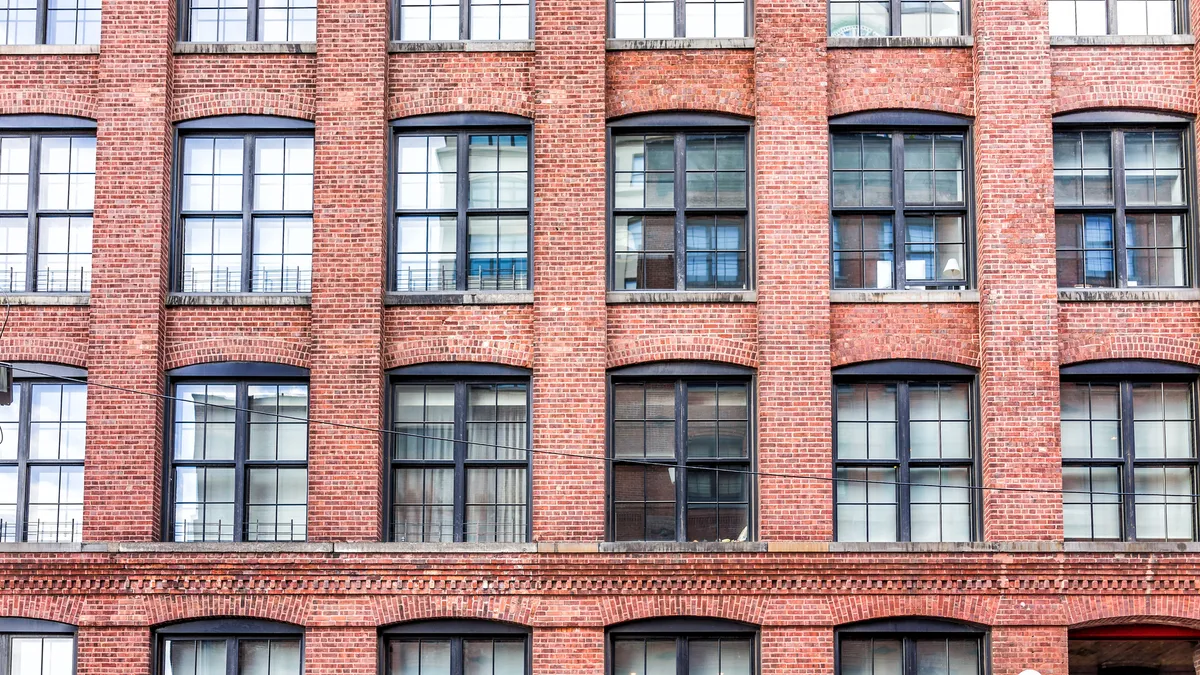 Pattern of brick glass window building