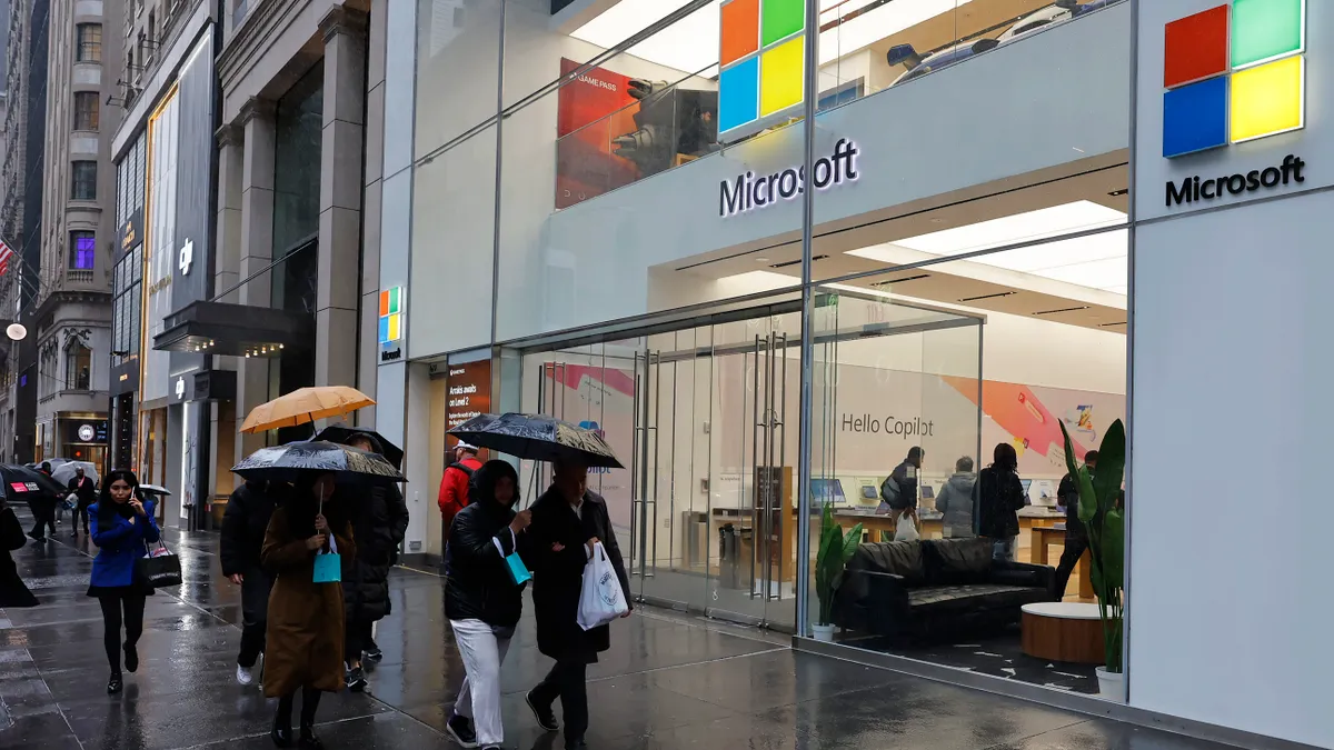 People walk past a Microsoft Experience Center on Fifth Avenue on April 03, 2024 in New York City.