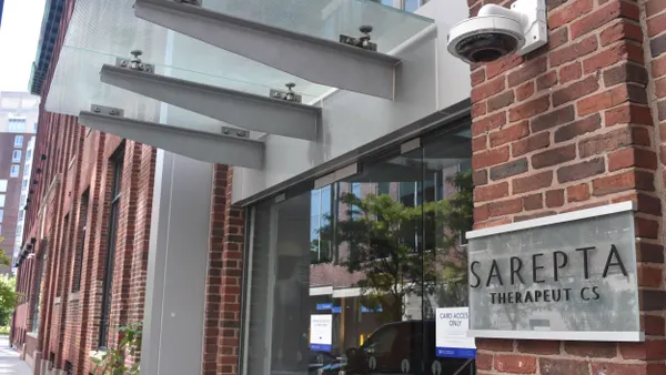 A Sarepta logo is displayed on a building in Cambridge, Massachusetts on Sept. 5, 2024.