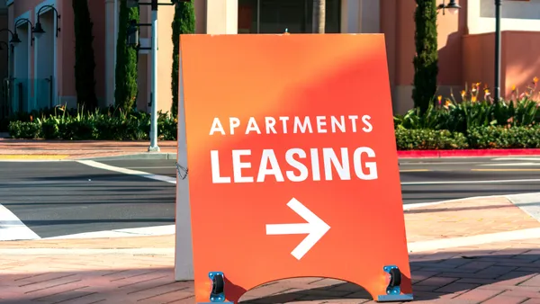 Orange apartments leasing sign