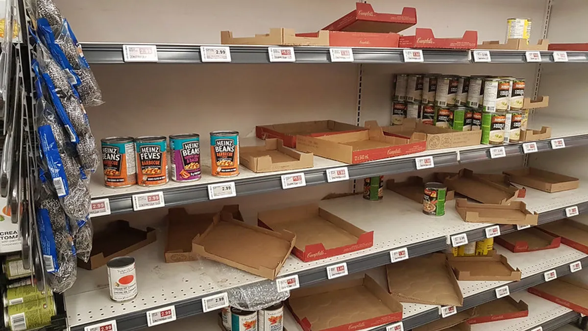 Mostly empty shelves of an Atlantic Superstore supermarket of Halifax, Nova Scotia, Canada, on 13 March 2020 due to panic buying related to the COVID-19 and coronavirus outbreak.