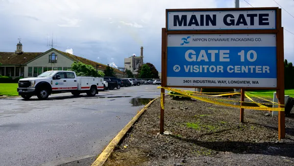 Exterior photo of emergency responders at a Nippon Dynawave Packaging facility in Longview, Washington