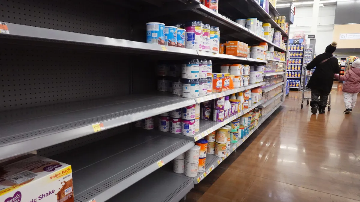 infant formula on a grocery store shelf