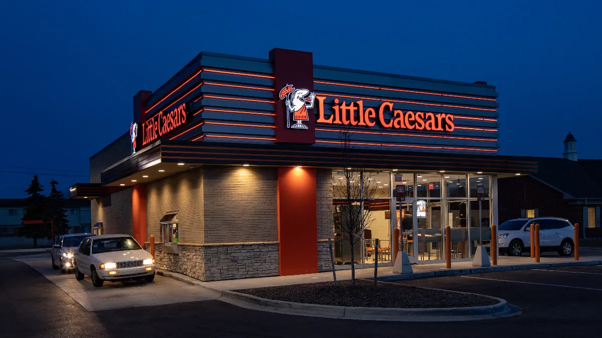 An image of a Little Caesars building with a drive thru