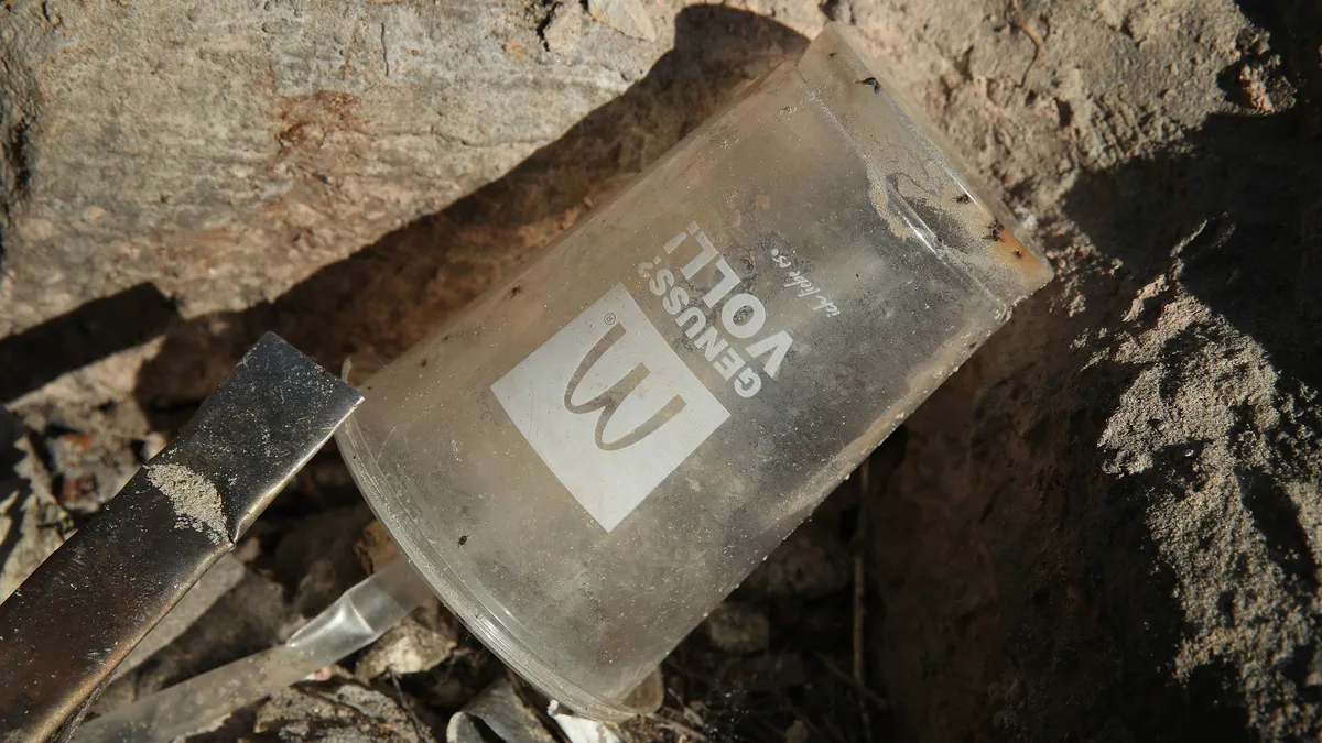 A plastic McDonald's cup on the ground in Germany