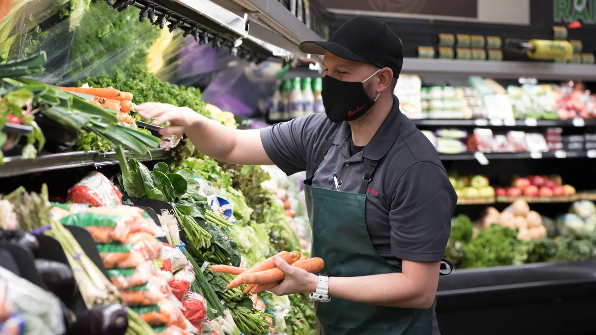 A Bashas' grocery worker