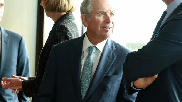 A person wearing a suit