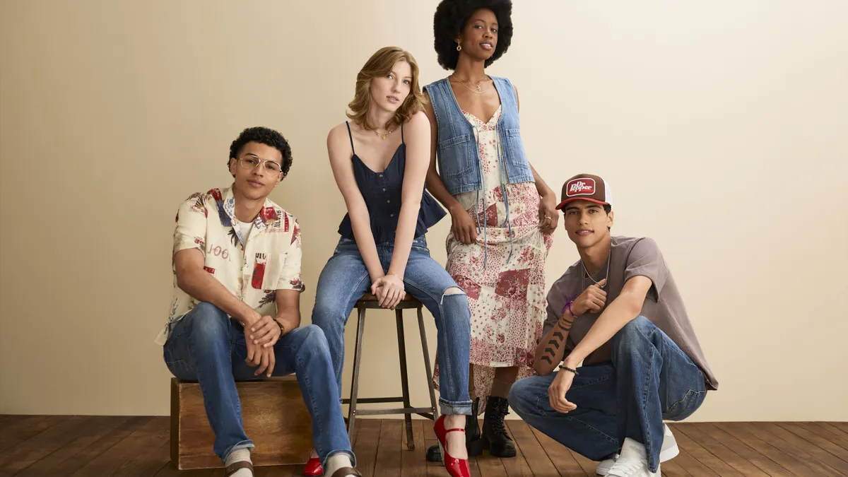 Young people model clothes from J.C. Penney's latest assortment.