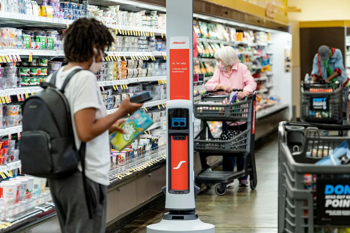 Simbe Robotics' Tally inventory robot operating in Schnucks supermarket