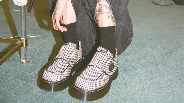 A model wears the MadeMe and Dr. Martens collaboration.