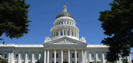 The California state capitol is shown July 4, 2003 in Sacramento, California. Supplemental Paid Sick Leave law provides covered employees with 80 hours of paid leave for qualifying COVID-related reasons.