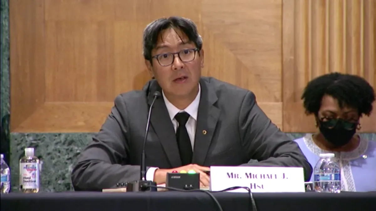 OCC Acting Comptroller Michael Hsu testifies in front of the Senate Banking Committee on Aug. 3, 2021